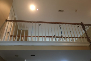 Complete Stair Make Over: Brand New Steps, Railings, and Iron Balusters