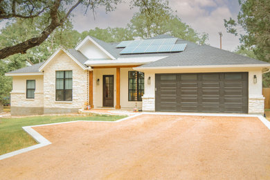 Inspiration for a mid-sized timeless white one-story mixed siding house exterior remodel in Austin