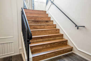 This is an example of a transitional staircase in Austin.