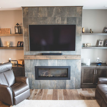 Living are with fireplace and shelves