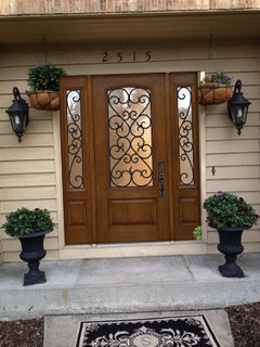 In need of suggestions for a new front door to wake up this 80s entry.