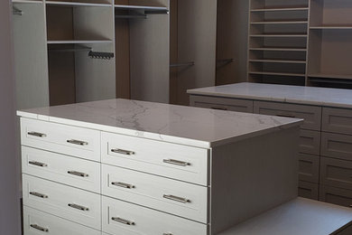 Dressing room - large transitional gender-neutral dark wood floor dressing room idea in DC Metro with shaker cabinets and white cabinets