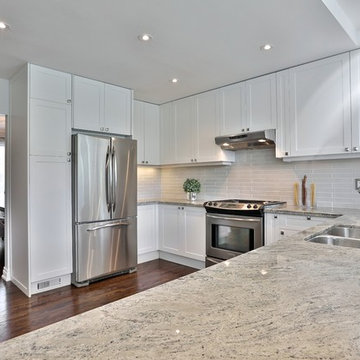 Shaker style kitchen and granite countertop in Toronto