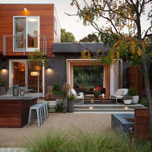 サンフランシスコのコンテンポラリースタイルのおしゃれな裏庭のテラス (日よけなし、真砂土舗装) の写真