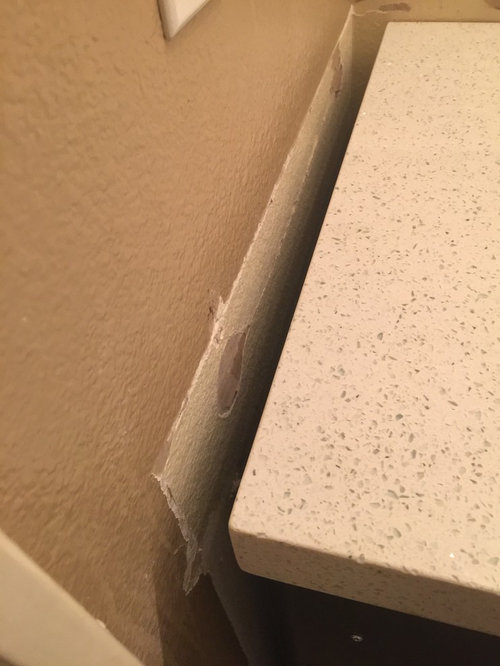 Installed vanity not wide enough. Any ideas without replacing top?