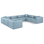Meridian Furniture - Cube Upholstered Modular Sectional, Light Blue, 8-Piece: 4 Armless Chair, 4 Corner Chair, Vegan Leather - Elevate your space with the luxurious Cube Vegan Leather Modular Sectional. This modular sectional exudes modern elegance, charm, and comfort making it a perfect addition to any contemporary living space. Its clean lines and cube shape are reminiscent of minimalist design, while the plush light blue vegan leather upholstery adds a touch of luxury and sophistication. The chair's versatile construction and geometric aesthetic seamlessly integrate into various design styles, from sleek living rooms to chic home offices, embodying the essence of modern design and creating a sense of order and tranquility in your space.