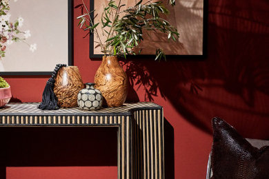 Example of a living room design in Philadelphia with red walls