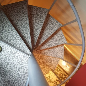 serged pie steps on metal spiral staircase