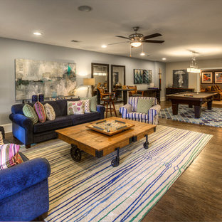 Photo of a classic basement in Atlanta with grey walls and dark hardwood flooring.