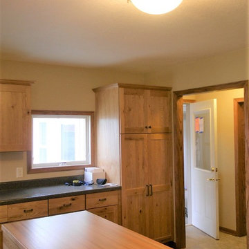 Omega Cabinetry. Monterey door, Pecan wood, Natural finish.