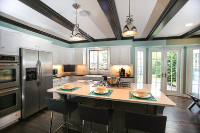 Eat-in kitchen - modern l-shaped eat-in kitchen idea in Minneapolis with a farmhouse sink, recessed-panel cabinets, light wood cabinets, quartz countertops, yellow backsplash, subway tile backsplash and stainless steel appliances