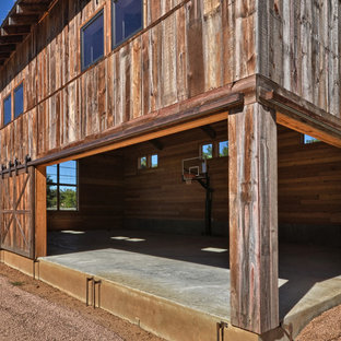 オースティンのラスティックスタイルのおしゃれなホームジム (コンクリートの床) の写真