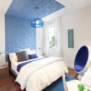 Inspiration for a contemporary kids' room remodel in Miami with multicolored walls