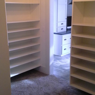 Master closet with shoe shelves