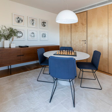 Round Dining Area with Blue Chairs and Walnut Sideboard, Lisbon