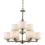 Trans Globe Lighting - Cahill Chandelier, 27.75" - The Cahill 27.75" wide Chandelier illuminates any room it is placed in and provides an elegant look to the living space. The body of the chandelier stands out among decor with its bold and glamorous design. Cool sleek sophistication defines this nine light chandelier. Understated mounting hardware and frame complement the White Frost glass drum shades.