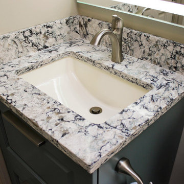 Small Masterbath with Green Cabinetry, Custom Tiled Shower and Storage