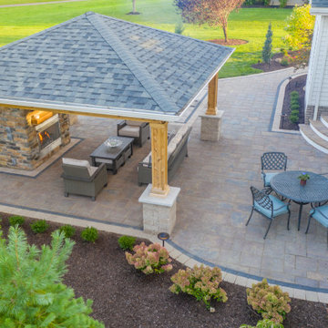 Medina Structure, Fireplace, Unilock Patio and Landscaping