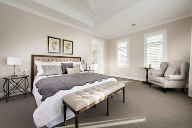 Photo of a traditional bedroom in Perth with beige walls, carpet and no fireplace.