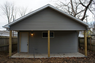 Mid-sized trendy detached two-car garage photo in Indianapolis