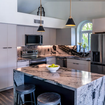 Matte Ivory Kitchen Remodel with Leathered Granite in Ahwautukee, AZ