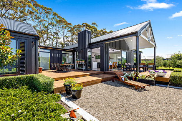 Farmhouse Deck by Designpoint Architecture