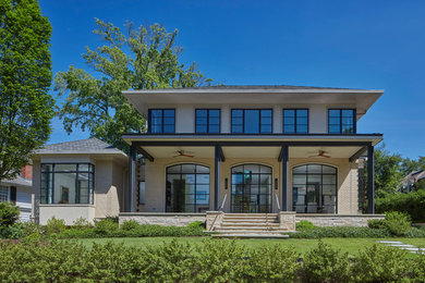 Trendy two-story brick house exterior photo in Atlanta with a hip roof and a mixed material roof