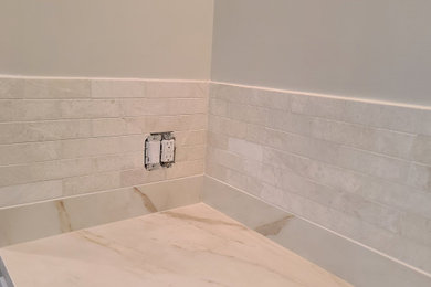 Mid-sized minimalist u-shaped enclosed kitchen photo in Salt Lake City with ceramic backsplash