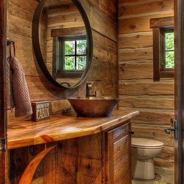 Weathered Antique Paneling in a Rustic Log Cabin Powder Room
