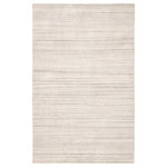 Jaipur Living - Jaipur Living Tundra Solid White Area Rug, 5'x8' - The Cason collection introduces balance and a relaxed vibe to any space. Hand loomed of durable and easy-to-clean polyester, the sophisticated Tundra rug features a tonal linear design in ivory and soft gray.