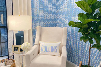 Example of a transitional boy wallpaper nursery design in Austin