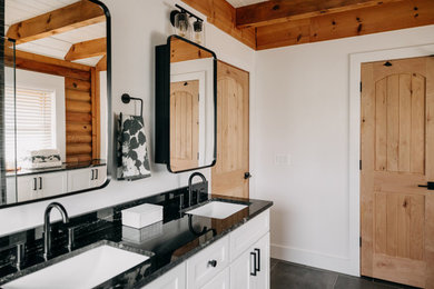Bathroom - small rustic bathroom idea in Detroit with granite countertops and green countertops