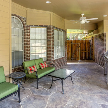 Stone Patio with Outdoor Kitchen and Pool