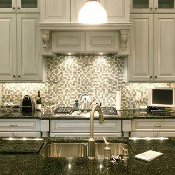 Green Butterfly grenite countertop with mosaic back splashes