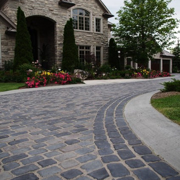 Cobble stone driveway with concrete Curbs