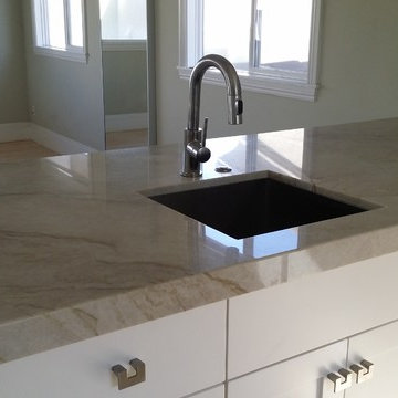 Kitchen Renovation of cabinets with full overlay and counter tops.