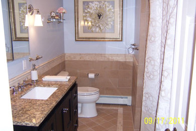 Bathroom - mid-sized contemporary bathroom idea in New York with furniture-like cabinets and a freestanding vanity