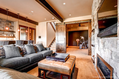 This is an example of a traditional family room in Denver.