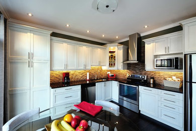 Kitchen - transitional kitchen idea in Toronto