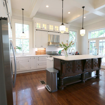Cottage with White Custom Cabinetry and Library Railing