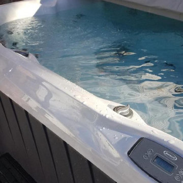 Deck remodeling project with jacuzzi installation