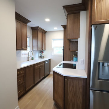 Rich & Refined: Custom Walnut Kitchen Remodel with White Quartz & Oak Flooring