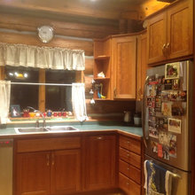 My well loved log home kitchen, with cherry cabinets and drawers.