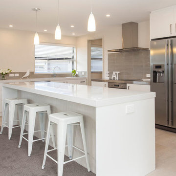 White Corian benches with stainless steel cooking area