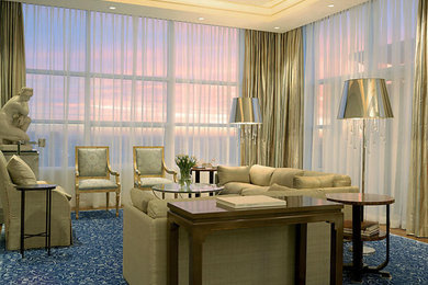 Mid-sized formal and enclosed medium tone wood floor living room photo in New York