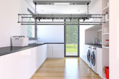 Design ideas for a large modern utility room in Perth.