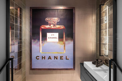 Inspiration for a small contemporary 3/4 gray tile and mirror tile marble floor, gray floor and single-sink bathroom remodel in Detroit with flat-panel cabinets, black cabinets, a wall-mount toilet, gray walls, a vessel sink, quartz countertops, black countertops and a floating vanity