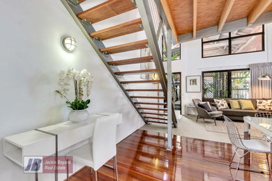 Design ideas for an industrial living room in Brisbane.