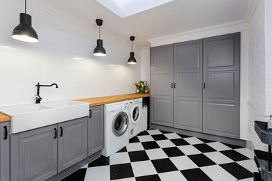 Inspiration for a mid-sized traditional laundry room in Perth.