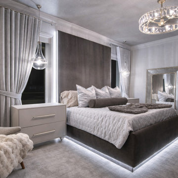 Luxury Bedroom with Layered Lighting and Soft Neutrals